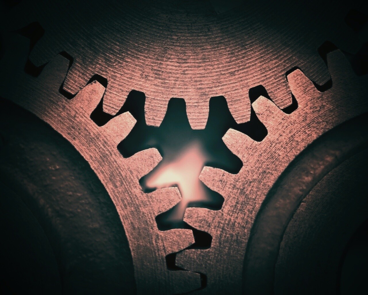 Три сцепленных шестерни обои