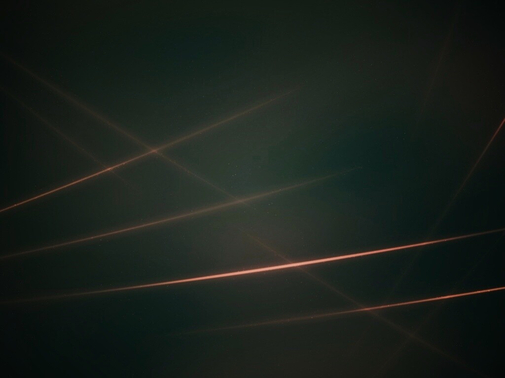 Лучи света на бронзовом фоне обои