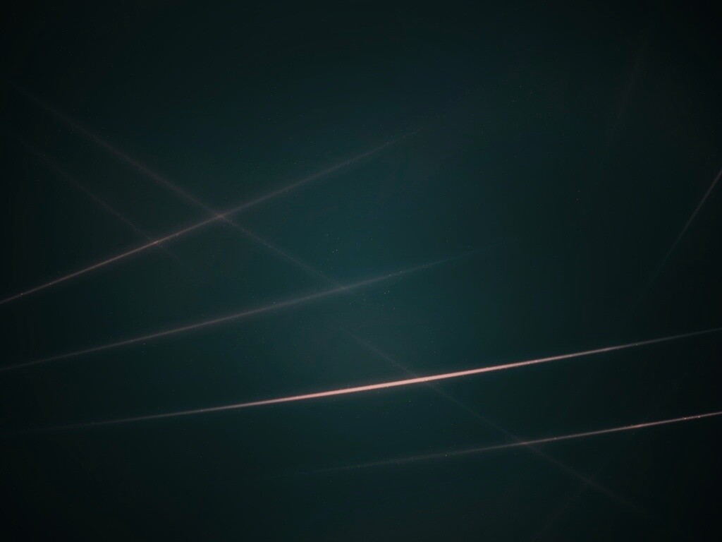 Лучи света на графитовом фоне обои