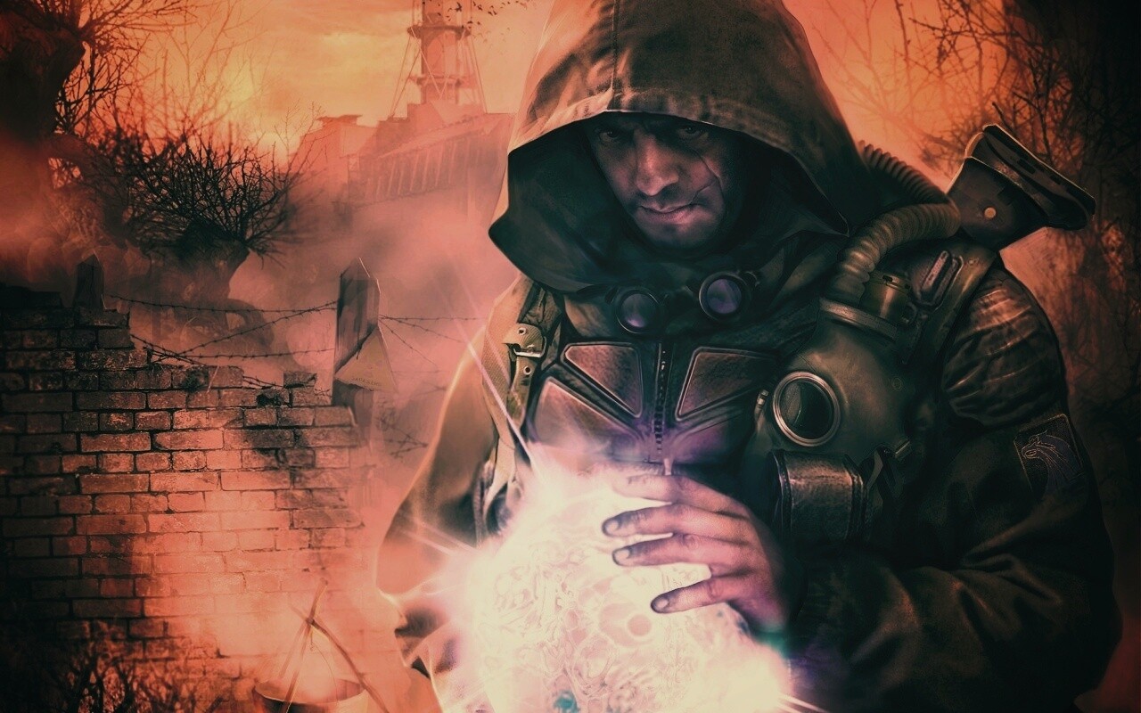 Сталкер с энергетическим артефактом в руках обои