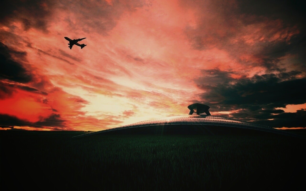 Самолет в закатном небе обои