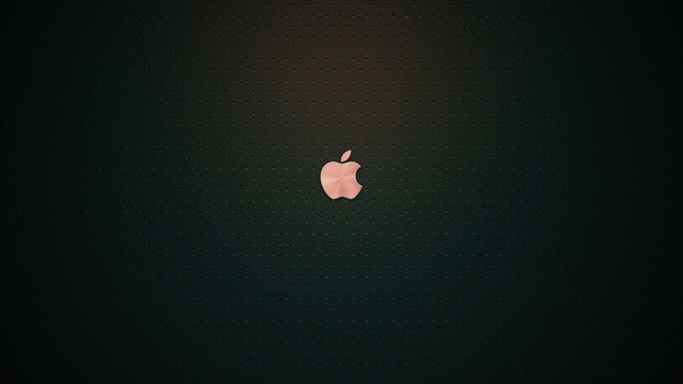 Маленький логотип Apple на перфорированной коже обои