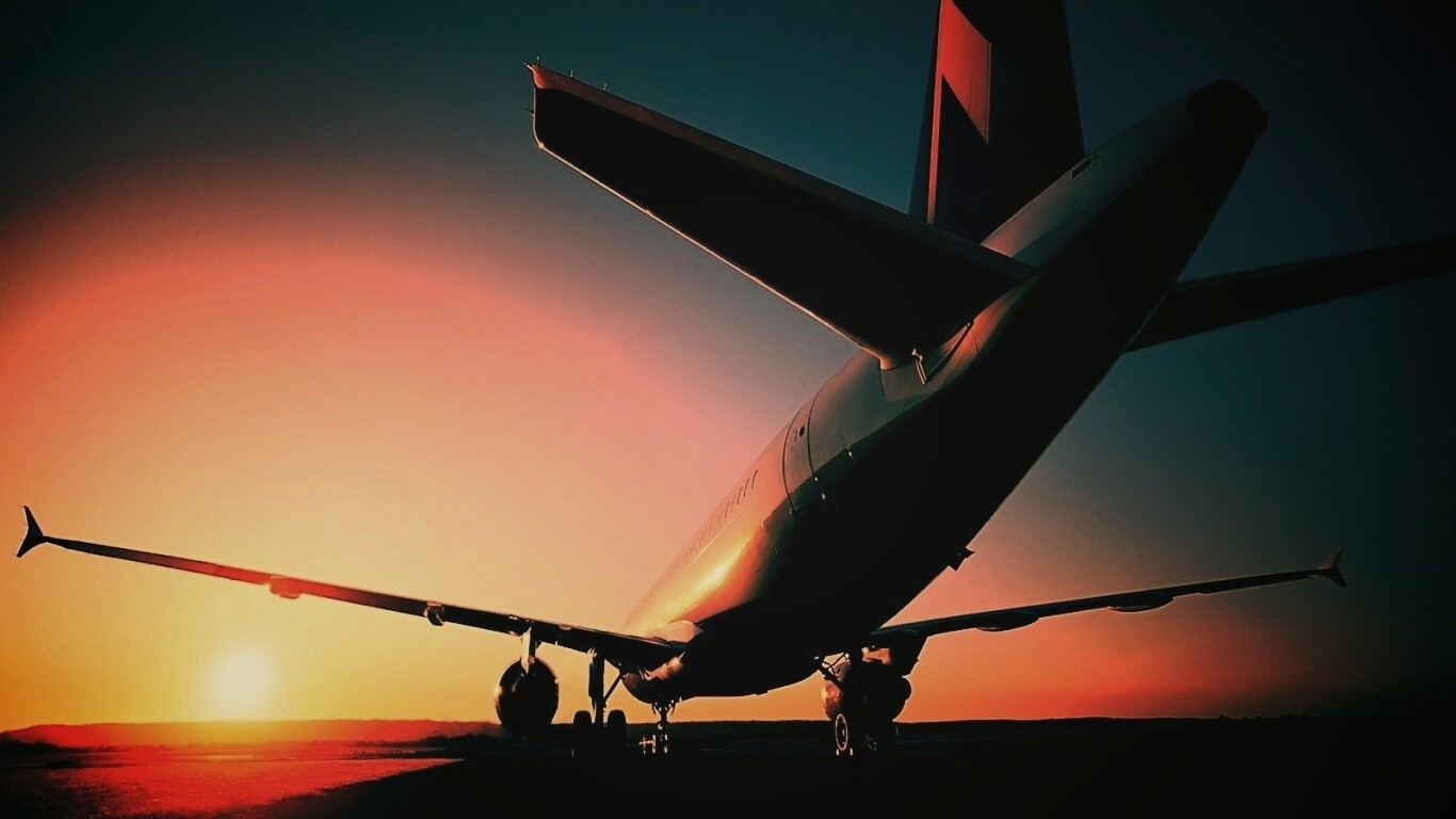 Самолет на закате обои