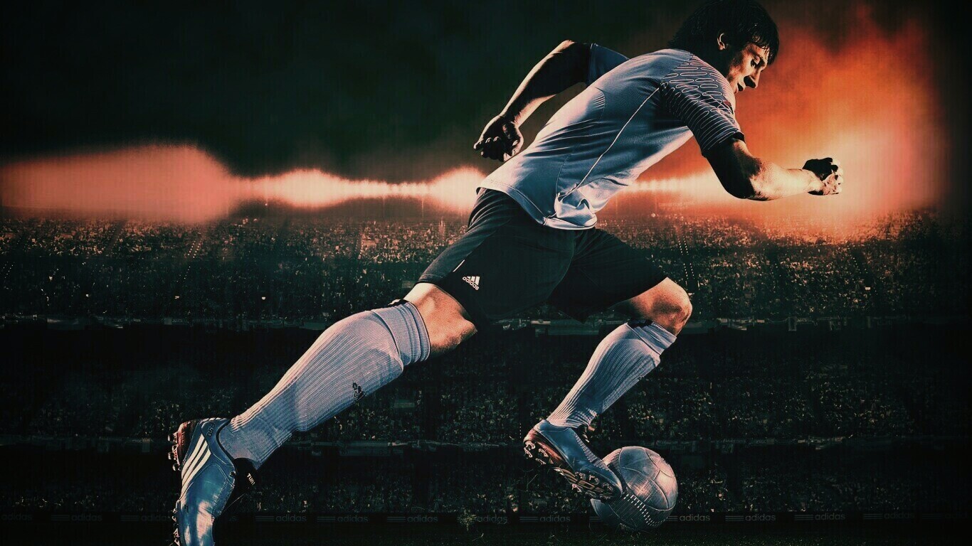 Футболист с мячом обои