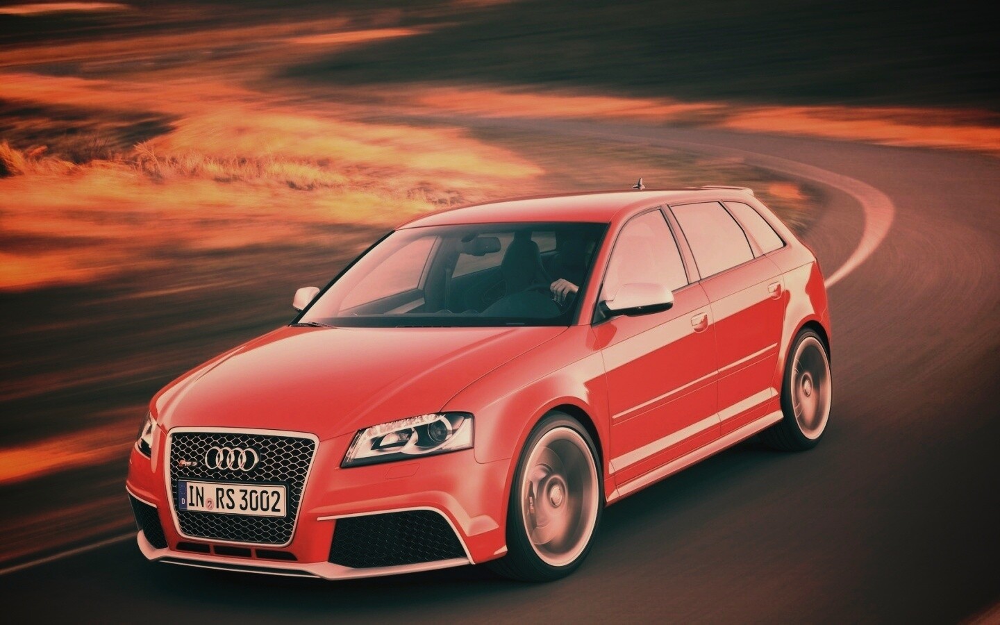 Красная ауди мчится по извилистой дороге обои