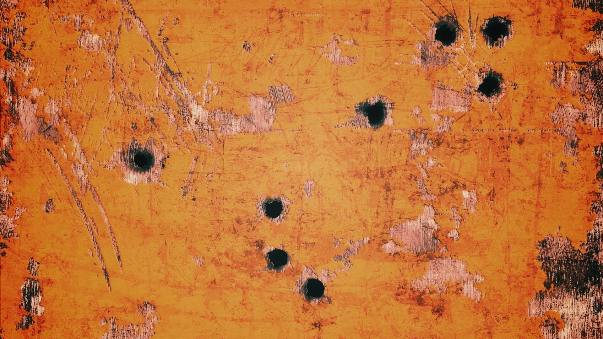 Пулевые отверстия в желтом листе обои