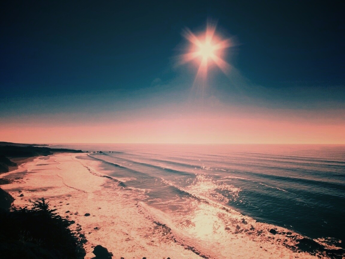 Солнце над морем обои