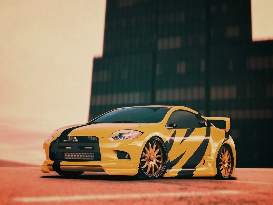 Mitsubishi жёлтого цвета с черными полосами обои