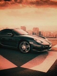 Порш на вертолетной площадке обои