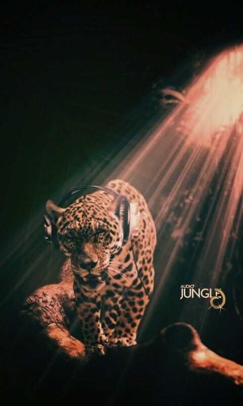 Ягуар в наушниках обои