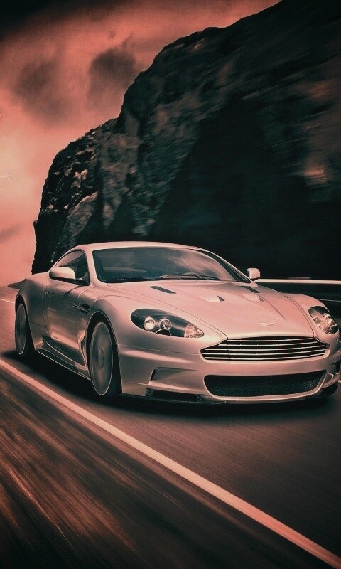 Астон мартин на горной дороге обои