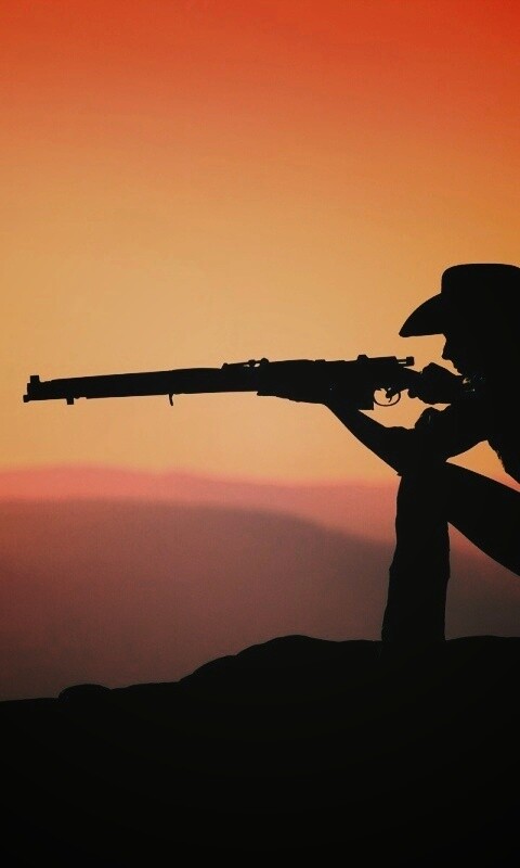 Стрелок на закате обои