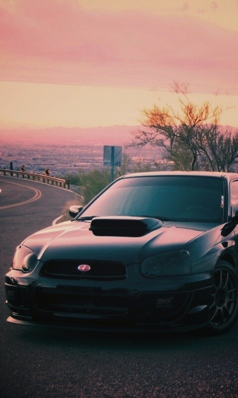 Субару на смотровой алощадке в горах обои