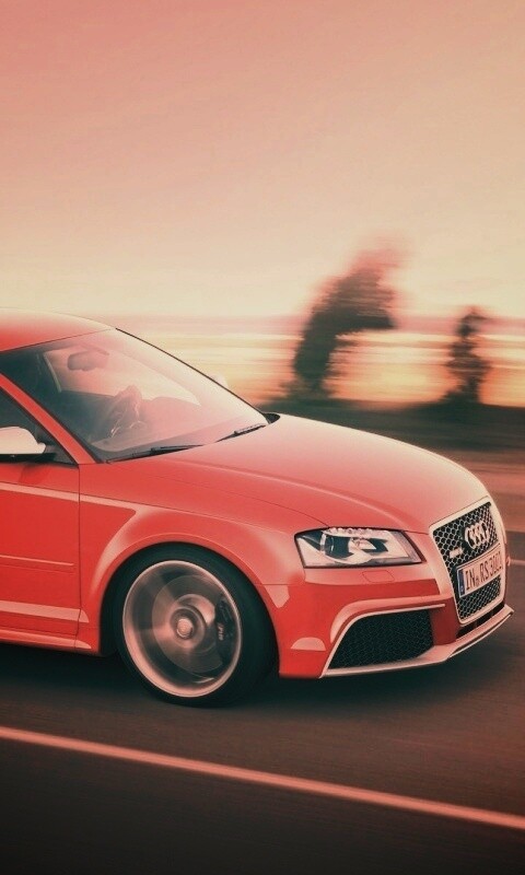 Красная Audi модели RS3 на дороге обои