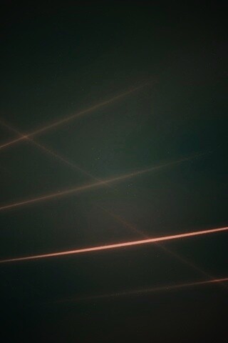 Лучи света на бронзовом фоне обои