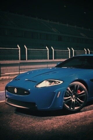 Синий спорткар на гоночном треке обои