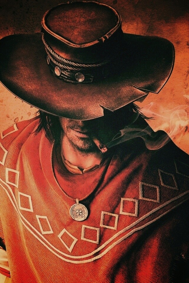 Мужик с сигарой в шляпе и пончо обои