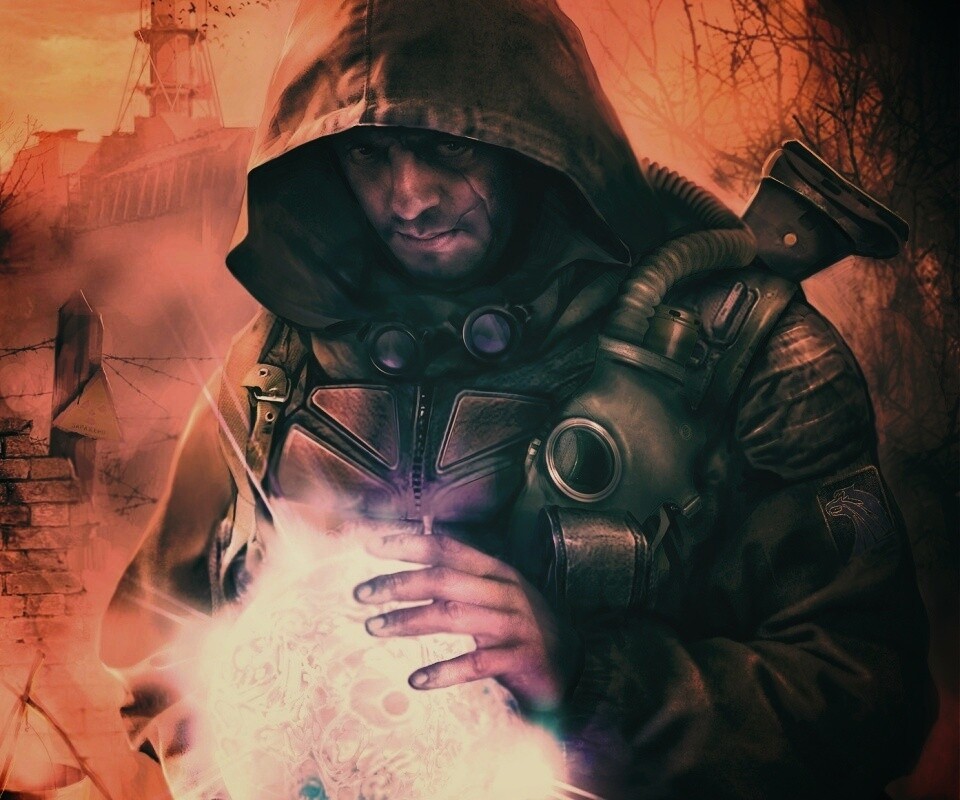 Сталкер с энергетическим артефактом в руках обои