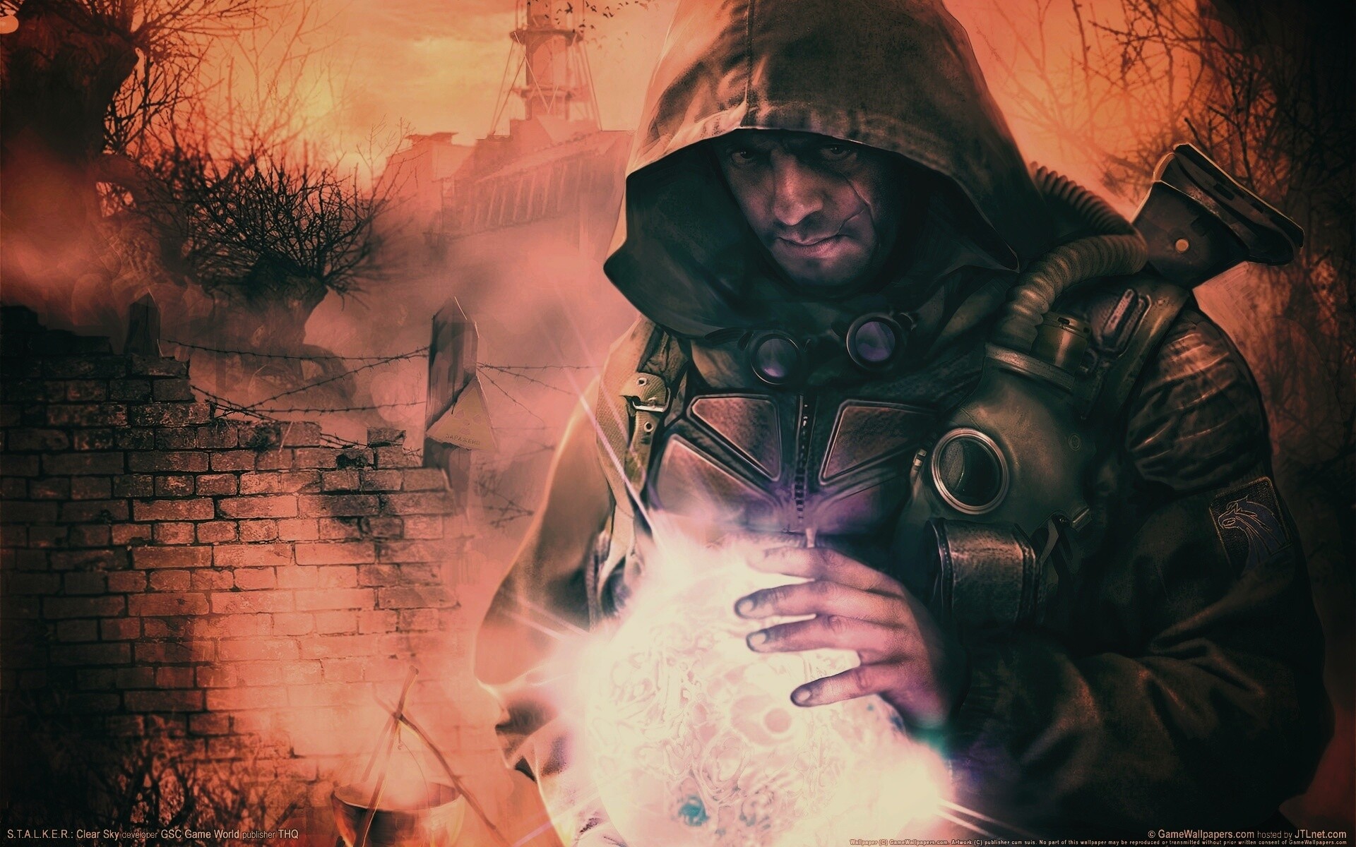 Сталкер с энергетическим артефактом в руках обои