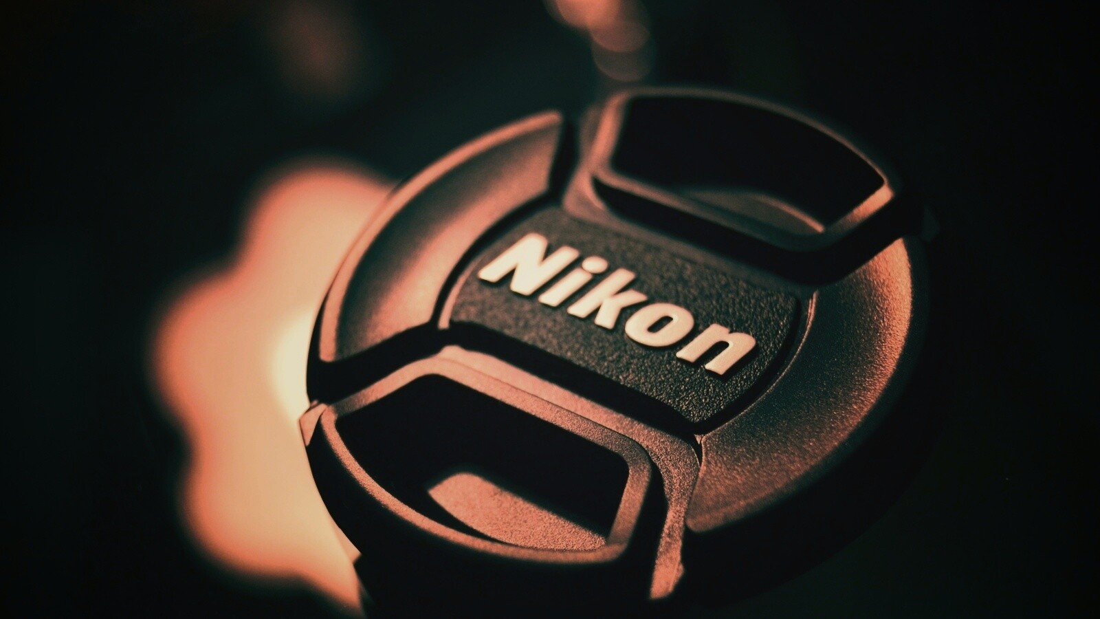 Крышечка от объектива Nikon обои