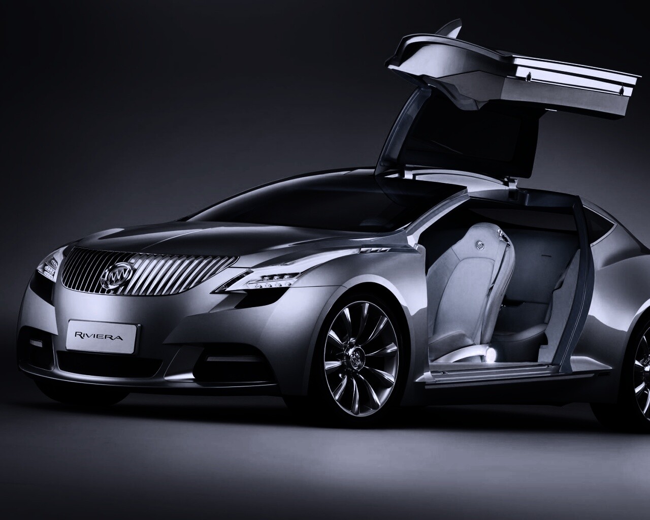 Buick Riviera с распахнутой дверцей обои