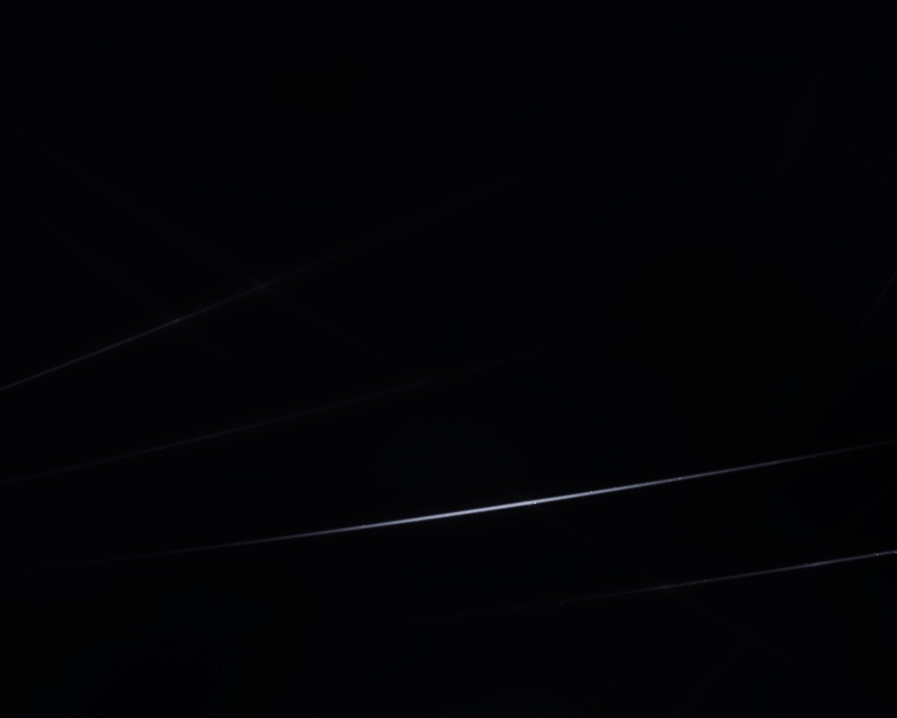 Лучи света на графитовом фоне обои