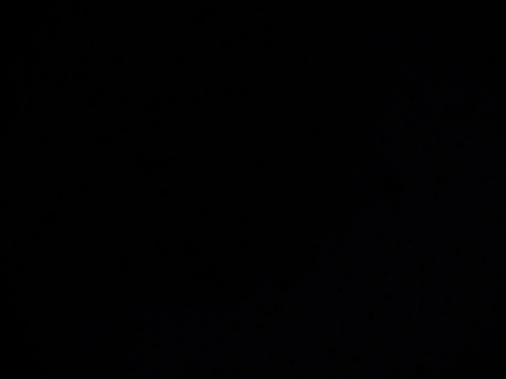 Черные пятна на сером фоне обои