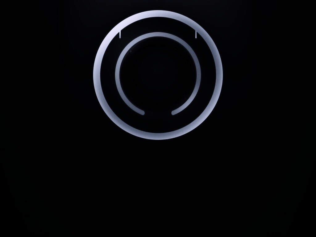 Диск из Tron на черном фоне обои