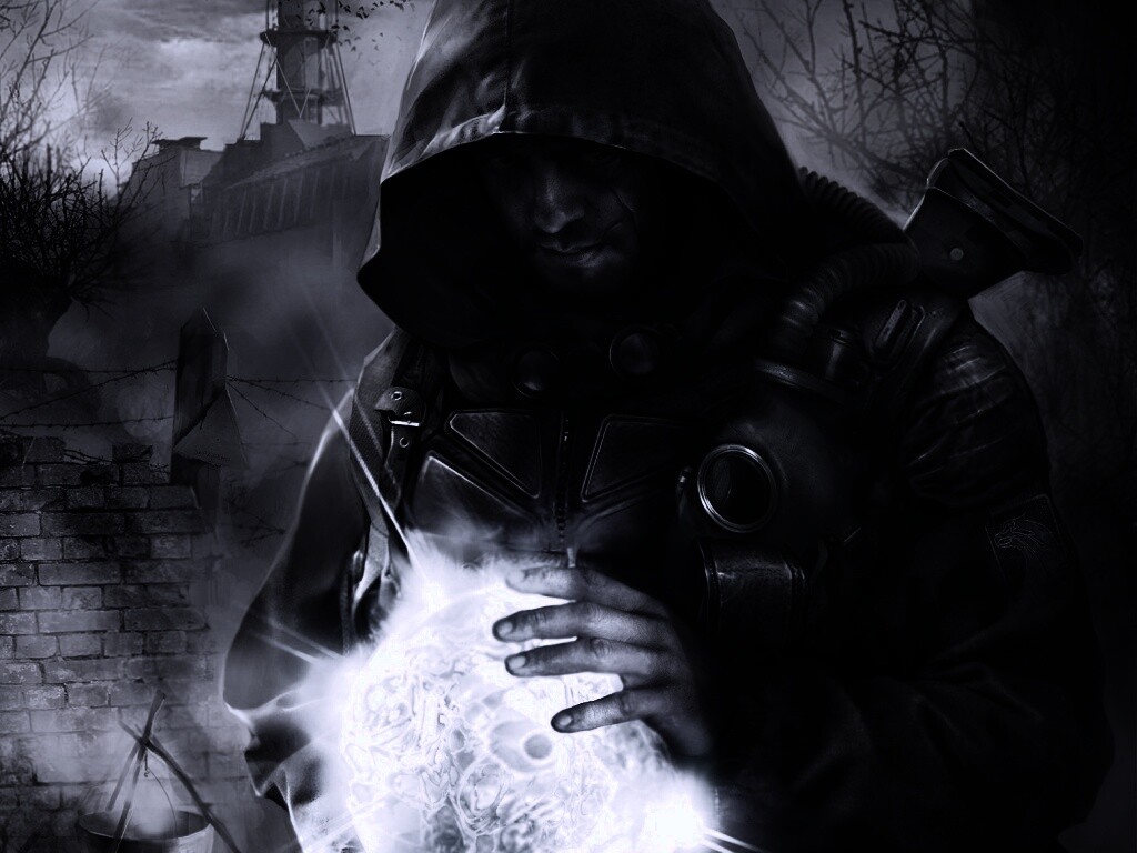 Сталкер с энергетическим артефактом в руках обои