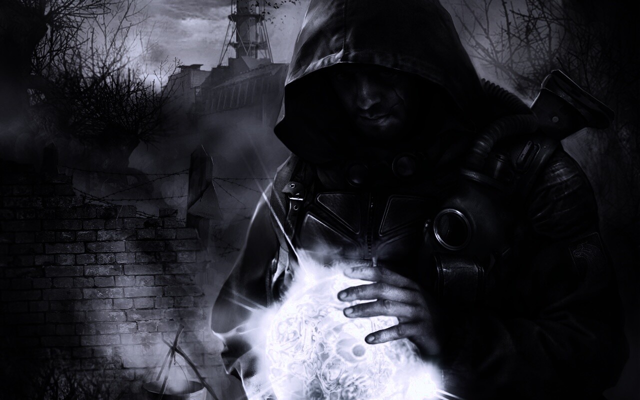 Сталкер с энергетическим артефактом в руках обои