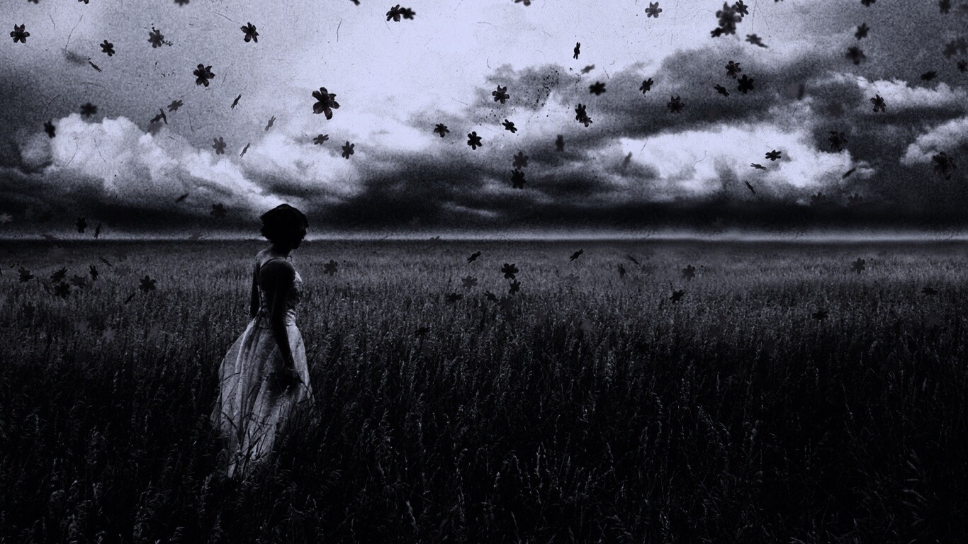 Грустная девушка в поле травы обои