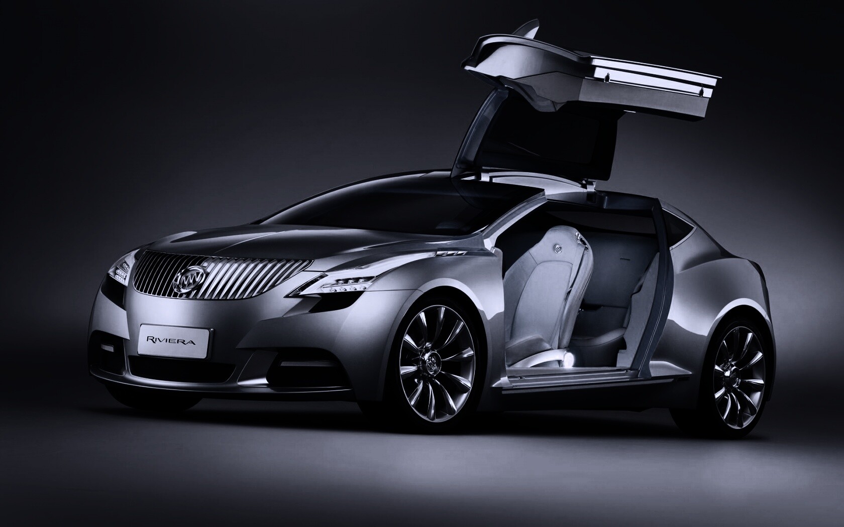 Buick Riviera с распахнутой дверцей обои
