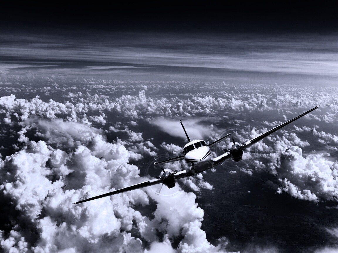 Самолет над облаками обои