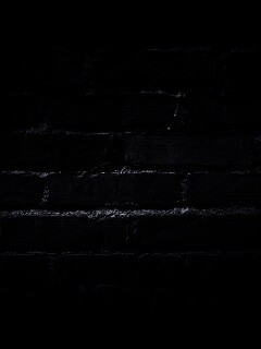 Затемненная кирпичная стена обои