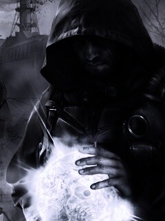 Сталкер с энергетическим артефактом в руках обои