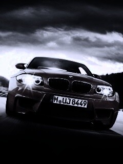 Оранжевый BMW M1 Coupe на треке обои