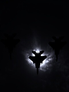 Ряд истрибителей на фоне солнца обои