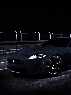 Синий спорткар на гоночном треке обои