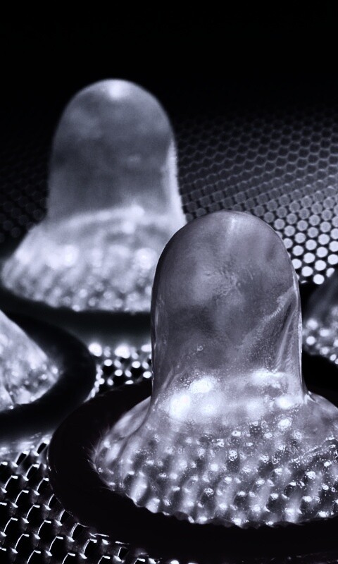 Разноцветные презервативы обои