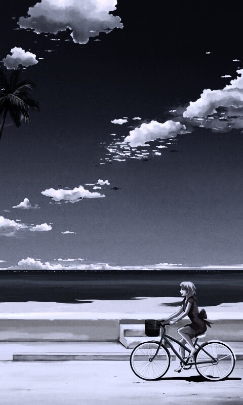 Девушка едет на велосипеде вдоль берега обои