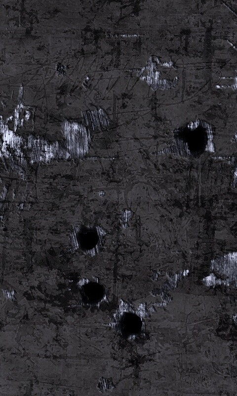 Пулевые отверстия в желтом листе обои