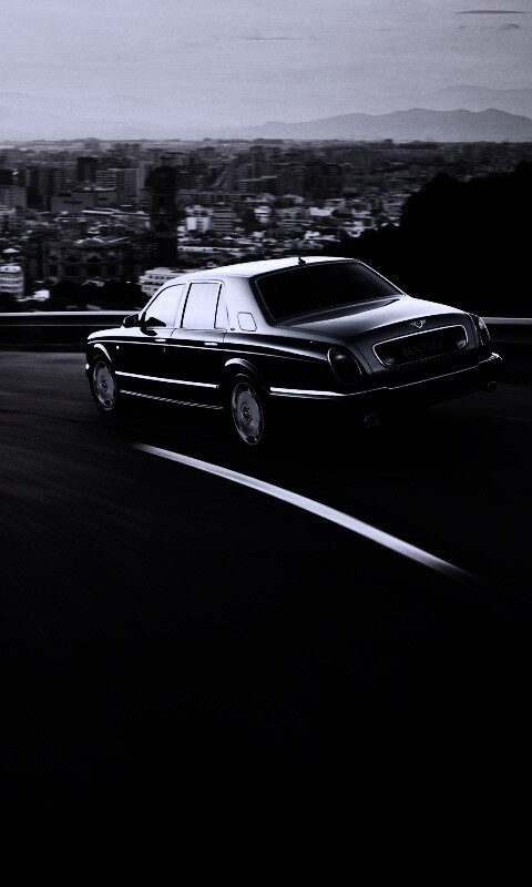 Черный Бентли на повороте обои