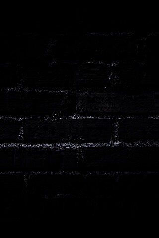 Затемненная кирпичная стена обои