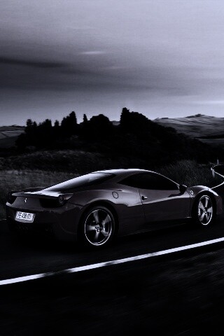 Красная феррари на извилистой дороге обои