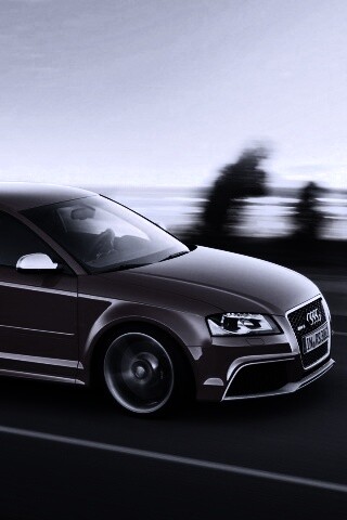 Красная Audi модели RS3 на дороге обои