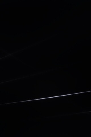 Лучи света на бронзовом фоне обои