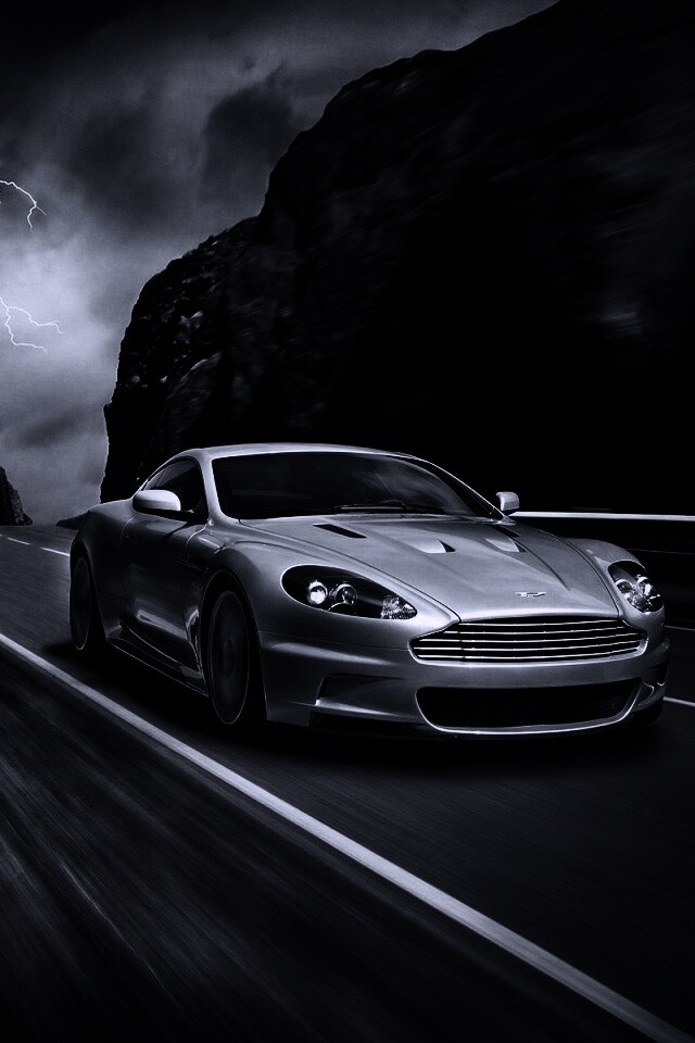 Астон мартин на горной дороге обои