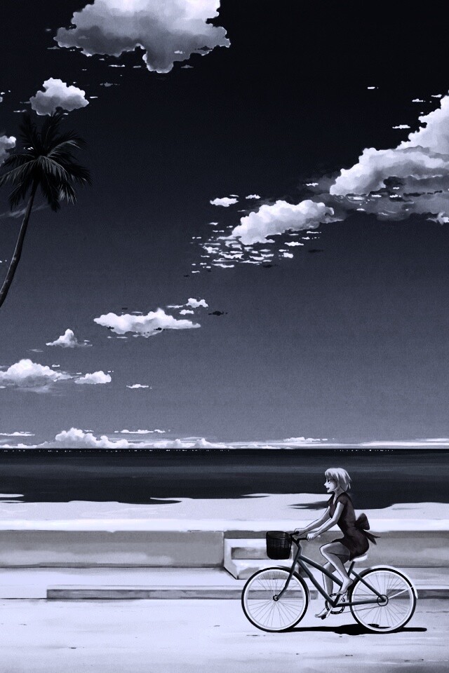 Девушка едет на велосипеде вдоль берега обои