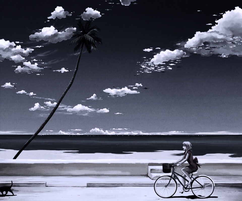 Девушка едет на велосипеде вдоль берега обои