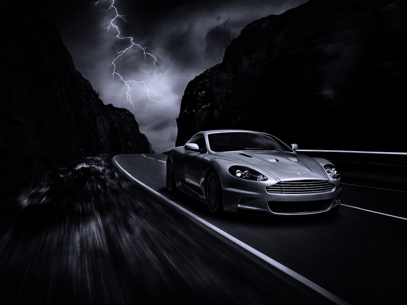 Астон мартин на горной дороге обои